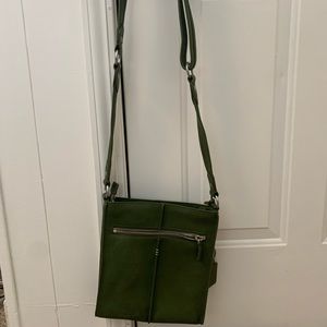Cute little cross body purse.  Perfect for travel.  Used once.